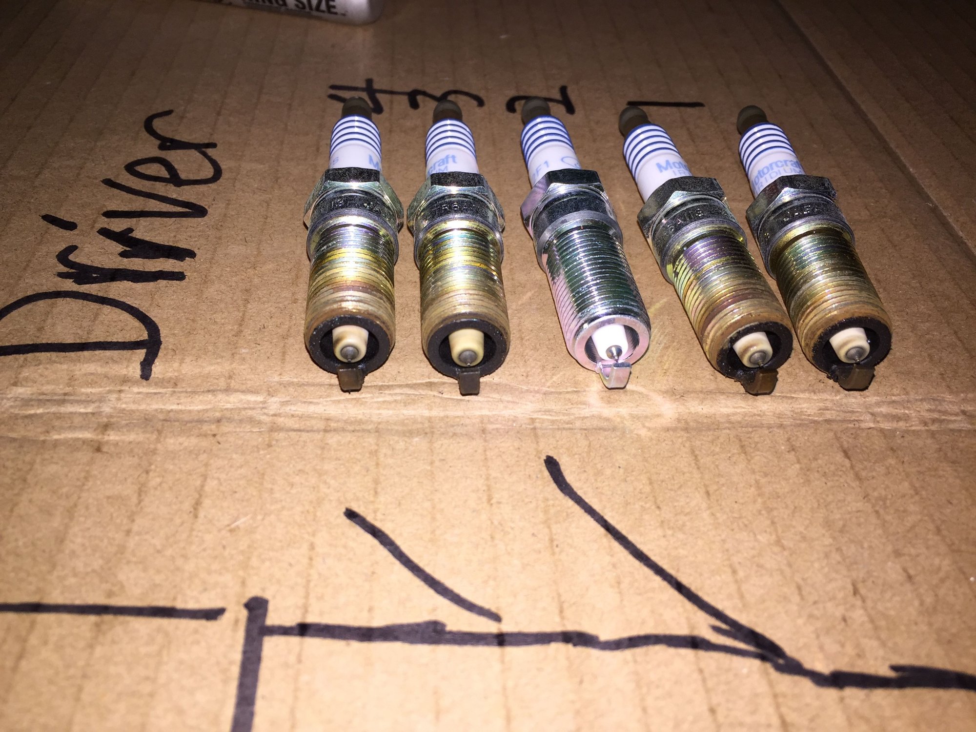 5.0 Engine Rattles when accelerating, pull all spark plugs, need help