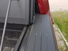 Full access to stake pocket with Backflip hard tonneau cover.  This one is an MX4, last truck had a G2