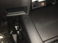 How the heck are you guys getting this left panel off?? There's a clip in this center console that clips into it. Seems the center console needs to be removed.