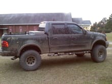 My old green 01 supercrew with a 6&quot; fabtech lift and leveling kit on 38&quot; super swampers (god i miss that thing)