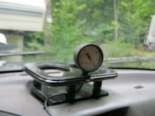 Sorry a bit fuzzy but this is my vacuum gauge and cup holder