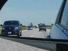 took a pic of the windmills behind me and a fellow F150er in my view.