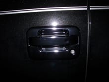 Drivers door handle and trim overlay in chrome painted with black chrome kit