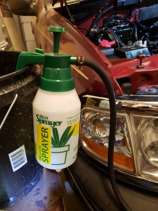 I made a mini pressure washer out of a plant spray bottle, a piece of hose and my compressed air blower nozzle. I can fill it with hot water and pump it up to a fairly decent pressure.