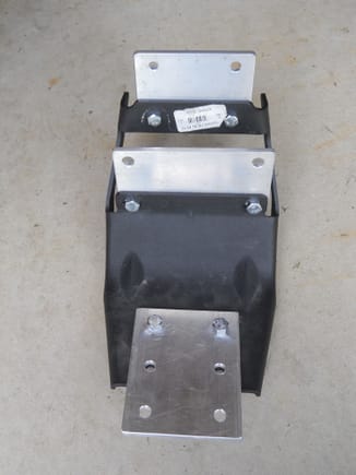 Plates bolted on the factory bracket