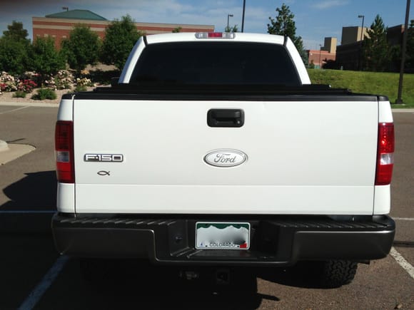 Rear View of F-150 and Ford Emblem Overlay