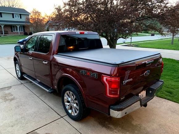 And today my tonneau cover arrived, so the kids and I put it on!  LED switchback turn signal bulbs should be here tomorrow, so that's next!