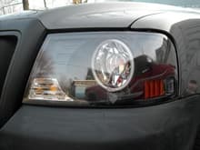 drivers side with new headlights