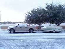 Pulling camper in Texas snow on hunting trip