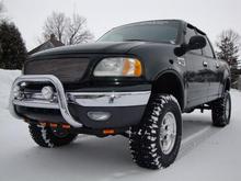 my lifted supercrew. good solid 8inchs of lift over stock height between lift and tires.