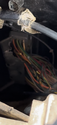 This is the picture that shows the back of the wiring harness.   This comes out of the computer and goes directly to the Fuse box on the right side of the engine bay, strapped to the firewall.   