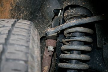 Driver side a-arm and ball joint w/ Plastidip (TM) repair job on coil spring, where the a-arm was rubbing