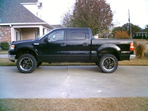 My first lift, wheels ,and tires.