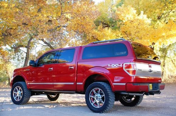 Fabtech 4-inch Suspension System with Nitto Trail Grappler MTs 295/60R20 (34-inches tall) mounted on Moto Metal 961 Wheels ( 18mm Offset, 5.71" BS) with PTM Inserts.
