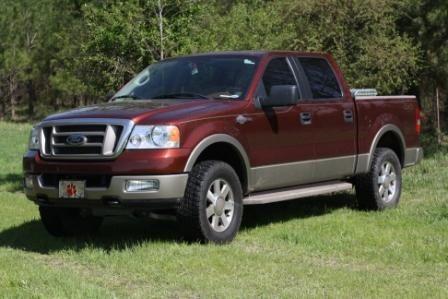 before adding the new king ranch rims, PTM door handles, and Bull Bar.