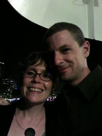 Here is me and my girl on a dinner cruise in the Boston harbor to celebrate our wedding.