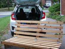 I might have under-estimated the size of this futon frame before I tried to stuff it into the 2016 Honda Fit.