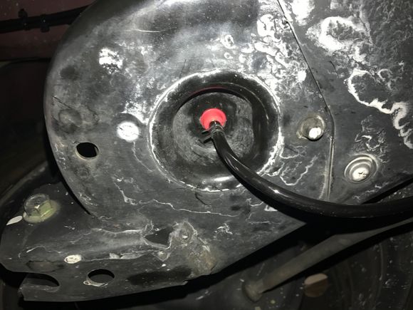 With the very little material removed you can see how much more nicely the fitting protrudes. Please ignore the dusty gravel water residue.  It looks like salt but luckily is not.