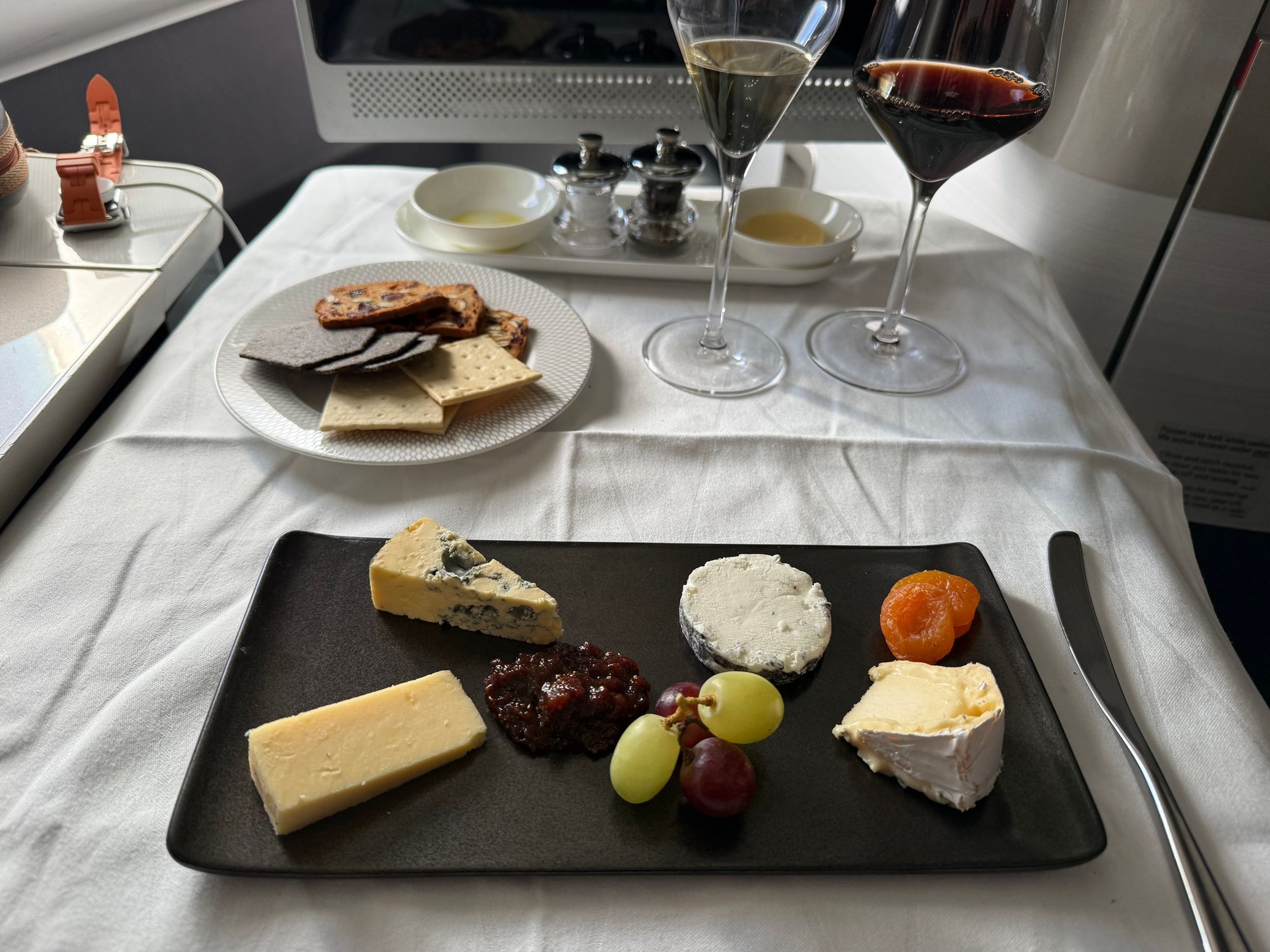 Cheese plate. Stilll a mystery to me why ba can serve very nice cheese plates in F and for r a nasty Tesco basic selection on us in the ccr. 