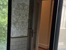 Old Bailey view behind bathroom mirror