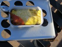 Watching the planes an omelette in a tin foil all airlines