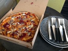 Cheese, tomato, sour cream, lingonberry and reindeer meat pizza!