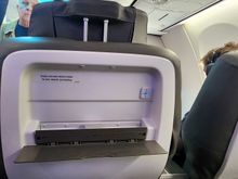 Device holder. The small metal piece in the middle slides up to hold the top of your device.