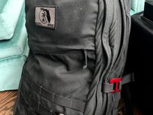 Front/side view of my 40L GR2. You can see the side handle mounted above the side molle. You can also see my metal G-hooks. 