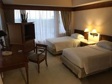Bedroom containing Twin beds (has a connecting door to next room)
