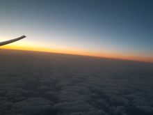 Sun setting under the 77W wing