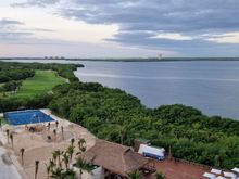 view facing the bay with sunset views, and if you enjoy watching aircraft land at CUN airport