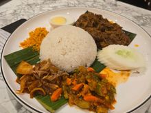 Nasi lemak with beef rendang