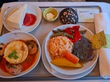 Everything served in one go. Helped me maximize sleep. Would have been bad on the day flight.