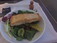 Main course Mediterranean salad with smokey tomato dressing accompanied by warm seared Scottish smoked salmon.  Seared my rear end, a bit meh