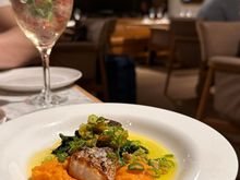 Barramundi is no longer served steamed Chinese style with rice, but on a bed of sweet potato mash. 