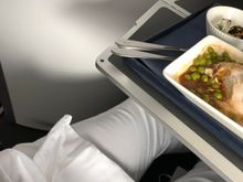 Plenty of room to exit the seat when the table is set with your meal - it retracts to a halfway stop