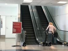 The escalator from T4 back to TBIT