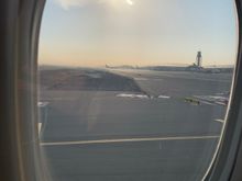 Look toward the control tower. 
