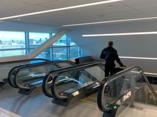 Second set of escalators down to gates