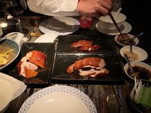 How devine - it was served with white section of scallion as well as cucumber and sauces.