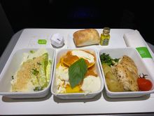 Caesar salad, ravioli, and chicken