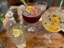 Water with lemon slices , cherry something & ginger lemonade 