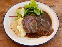 Steak with truffle mash and salad