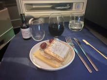 Nice chat with the purser about the wine trio UAL did when they rolled out Polaris…. But he said no one ordered it; i had a white with the salad, fish; red with the cheese and Port before bed.