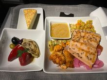 I had a quinoa dish with grilled salmon.    The sauce was mustard-y & absolutely delicious!   I drenched everything in it.    Dessert for us both was a cheesecake.  