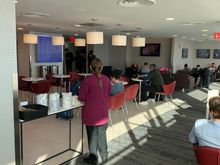 Additional 20-25 seats behind me. Also has toilets to the left of me in this photo