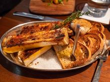 Roasted bone marrow, a standby at Blue Duck. This time, it was served with bourbon butter and pretzel crumbles with roasted garlic. Tasty and quite filling, as usual.  I do prefer when they season it a bit more strongly (the bourbon butter was too subtle), but smearing the roasted garlic atop each slice of toast did give plenty of flavor.