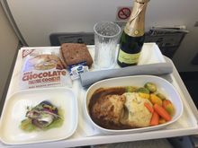 Pre-lunch drinks were served 35 minutes after takeoff. Herring for starter and chicken for main.
No water available so no coffee or tea and also no hand wash in toilet. No hot towels today either.