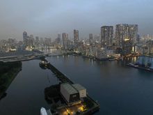 Twilight from lounge balcony looking up Sumida river 