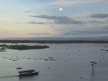 Moonlight over the river from the malecon